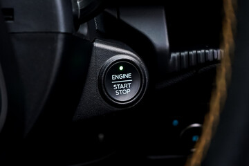 Close up engine car start button. Start stop engine modern new car button,Makes it easy to turn...