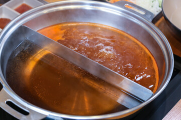 Korean style Shabu Shabu. Two types of broth. Mild and spicy taste