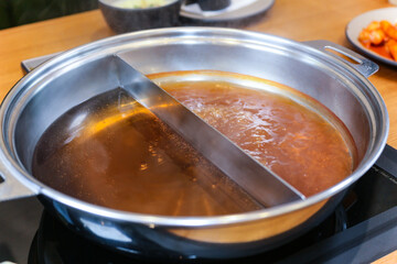 Korean style Shabu Shabu. Two types of broth. Mild and spicy taste