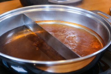 Korean style Shabu Shabu. Two types of broth. Mild and spicy taste