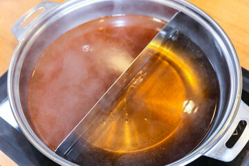 Korean style Shabu Shabu. Two types of broth. Mild and spicy taste