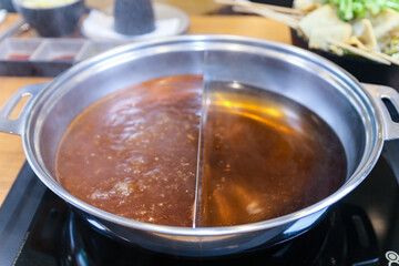 Korean style Shabu Shabu. Two types of broth. Mild and spicy taste