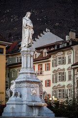Fototapeta premium Bolzano between dusk and night. Christmas atmospheres among the historic buildings. Advent.