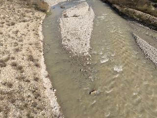 Arda river flowing near mignano val tolla in piacenza, italy