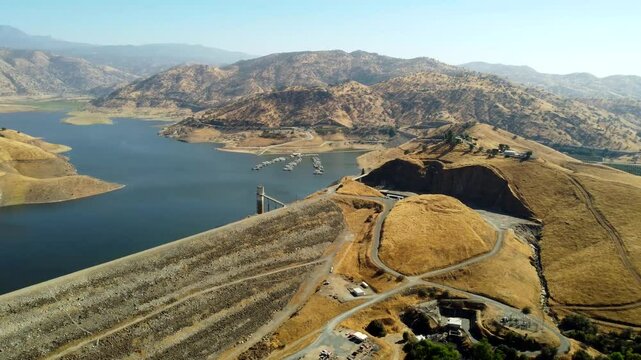 USA, CA, Visalia, Lake Kaweah, 45586 - Drone view of Lake Kaweah. Lemon Hill Recreation Area and the Kaweah Heritage Visitor Center is the parking lot, with the marina, dam and spillway
