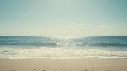 Serene Ocean View with Gentle Waves and Sunlight