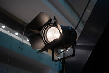professional classic single spotlight for cinema hanging from ceiling
