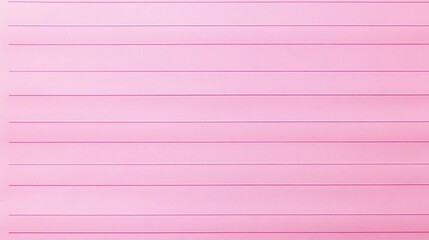 A close-up shot of a pink sheet of lined paper with a smooth texture. The paper has a subtle sheen and the lines are evenly spaced.