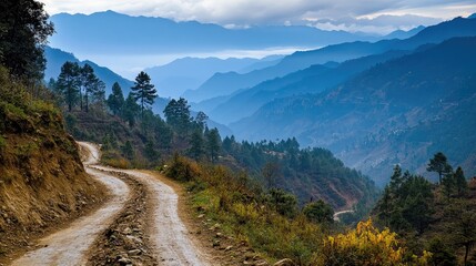 Naklejka premium Trekking path winding through rough mountainous landscape