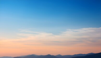 Obraz premium nature-inspired background featuring a soft gradient sky blending from pale blue to warm
