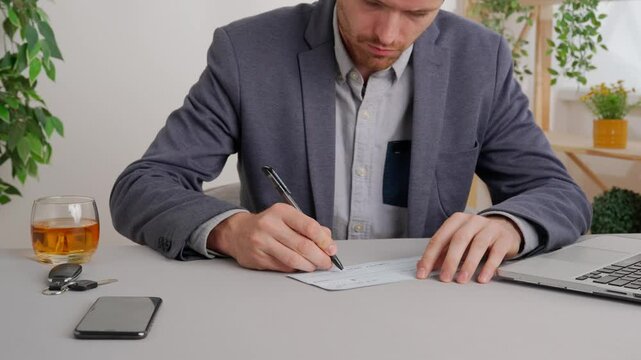 Business man at office desk signs check receives cash and making handshake with partner. Private commercial and business payments.
