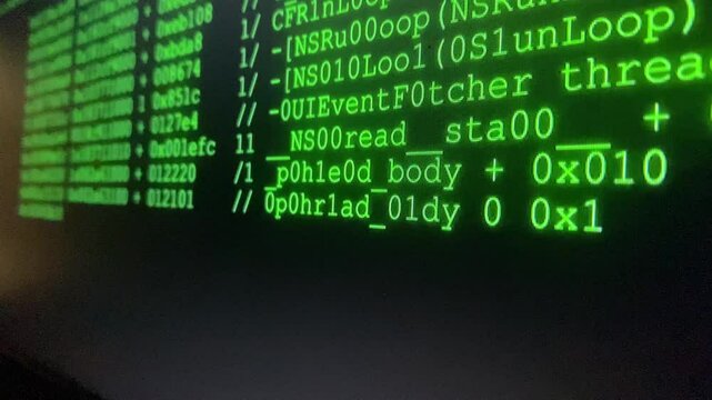 computer screen  displays binary code 