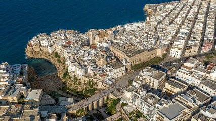 Aerial view at sunset of the historic center of Polignano a Mare, in the province of Bari, Puglia,...