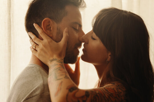 Intimate couple embracing and sharing a tender moment