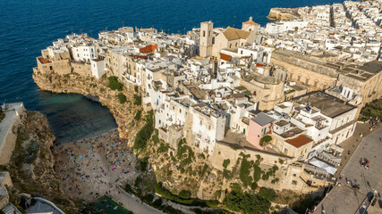 Aerial view at sunset of the historic center of Polignano a Mare, in the province of Bari, Puglia,...