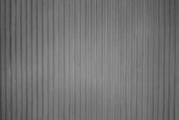 Fototapeta premium wall made of decorative plaster in the form of longitudinal lines close-up