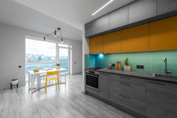 Modern Kitchen Interior Stylish Furniture Hardwood Floor. Oven, Sink, Flower, Minimalistic Interior Design. LED Lights, Hardwood Floor. White Walls. Open Space, Dinig Table Widows Flowers