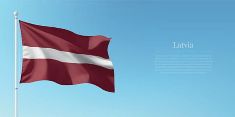 Waving Flag of Latvia Against Clear Blue Sky Copyspace