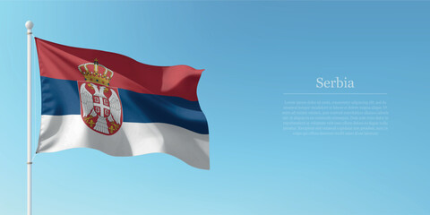 Waving Flag of Serbia Against Clear Blue Sky Copyspace