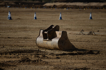 excavator bucket in a field
