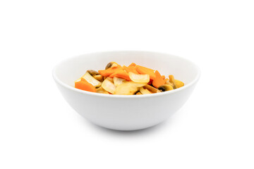 A simple white bowl contains a colorful mix of sliced fruits and vegetables, showcasing a healthy, nutritious meal option.