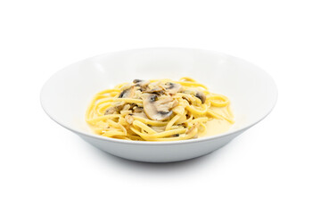 A bowl of creamy pasta topped with mushrooms and walnuts, served on a clean, white background for an appealing presentation.