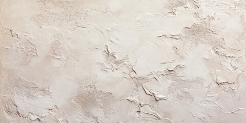 Textured plaster in a soft blush hue with gentle imperfections, adding warmth and character