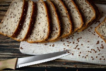
Freshly baked bread with grains. on a wooden background. baking