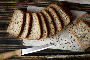 
Freshly baked bread with grains. on a wooden background. baking