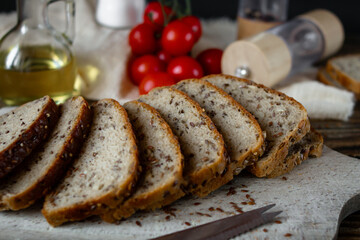 
Freshly baked bread with grains. on a wooden background. baking
