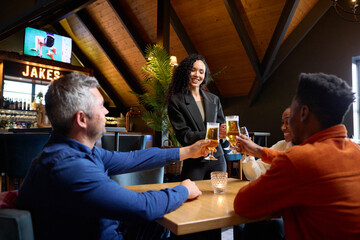 A group of friends celebrating their best friends huge achievement