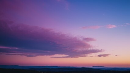 A breathtaking twilight scene showcasing a crescent moon and evening star over serene mountain silhouettes, perfect for nature lovers and tranquil landscapes