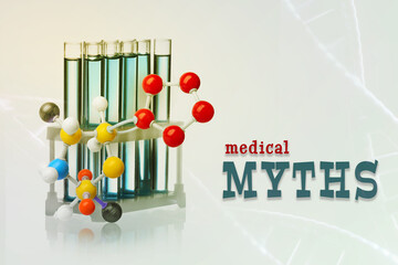 Medical myths. Molecular model and rack with test tubes on white background