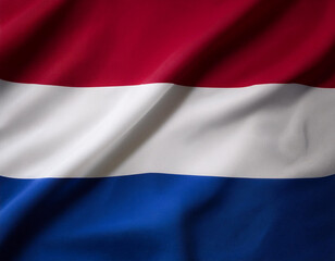 Obraz premium Dutch flag waving in the wind. Close up of Dutch banner blowing, soft and smooth silk. Cloth fabric texture ensign background. Use it for national day and country occasions concept