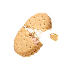 Tasty broken sandwich cookie in air on white background