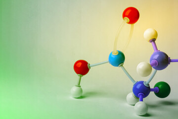 Molecular model on color background, space for text