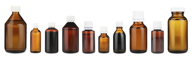 Many different glass bottles isolated on white