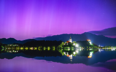 night landscape at Bled with aurora,lake and mountains