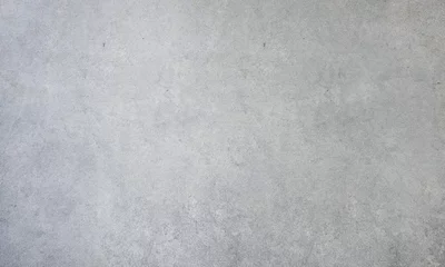 Fototapeten Konkrete Gray textured wall background. Faded wall texture background. Light gray textured wall, showcasing a smooth, subtle concrete surface. Ideal as a neutral backdrop for design projects and presentations.  © rpdesignstudio