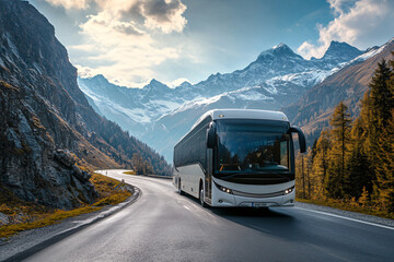 Tourist bus driving on mountain road surrounded by scenic alpine landscape