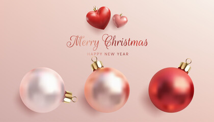 3D shiny Christmas balls in pink, red, and rose gold. Heart shape toys. The glossy, round spheres are isolated on a white background, perfect for holiday decor and greeting cards. Not AI.