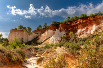 Blue sky with white clouds over Canyon Massif des Ochres du Luberon landscape France