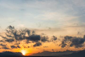 Beautiful Blazing Sunrise and golden sky landscape over the Sea.