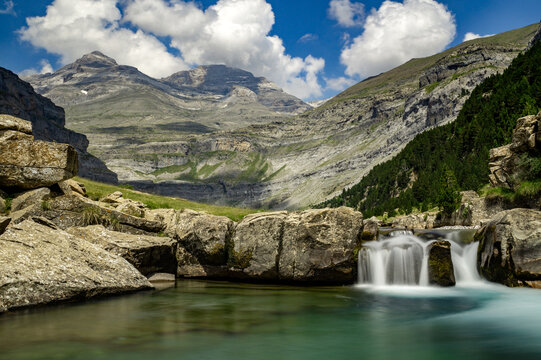 Ara river waterfalls in the Soaso circus in the Ordesa Valley National Park in Aragon Pyrenees with the Lost Peak (Monte Perdido) in the background. Huesca, Spain.