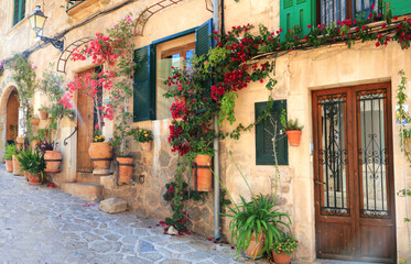 Mallorca (Majorca) island- traditional village Valldemossa with charming floral street decoration. Popular tourist attraction. Spain, Balearic islands
