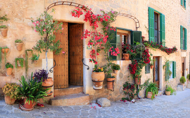 Mallorca (Majorca) island- traditional village Valldemossa with charming floral street decoration. Popular tourist attraction. Spain, Balearic islands