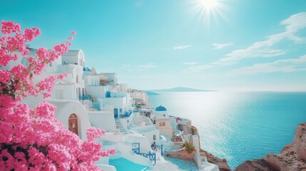 Obraz premium White Mediterranean Architecture with Pink Bougainvillea Overlooking Blue Sea in Greece 