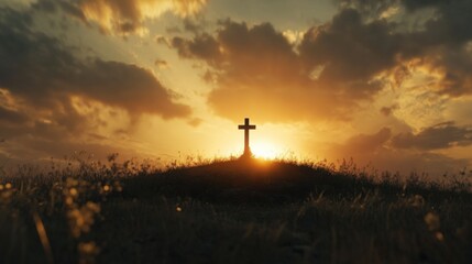 Fototapeta premium A dark silhouette of a cross stands prominently on a small hill, against a backdrop of a vibrant sunset and scattered clouds. The golden light casts a peaceful aura