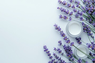 Glass jars with cosmetic product and fresh lavender flowers on white background, copy space, top view.