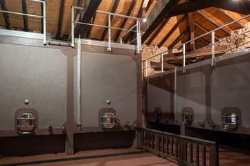 Old concrete tanks for first fermentation of grapes on Bordeaux winery, Saint-Emilion wine making...